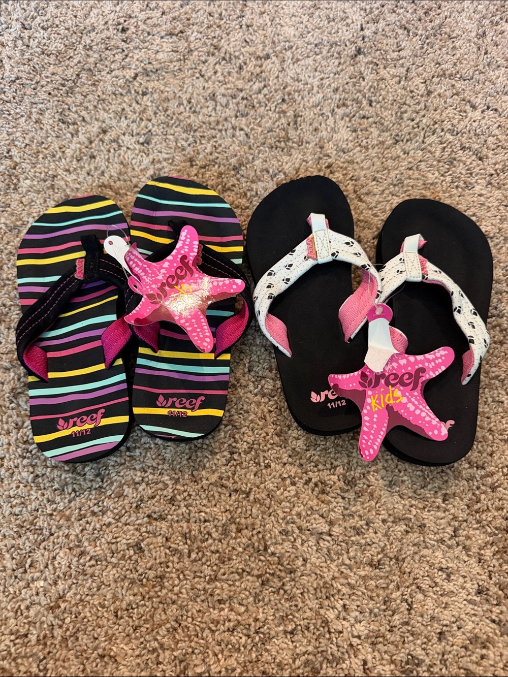Reef Kids Black Flip Flops with Pink Starfish and Multicolor Stripes